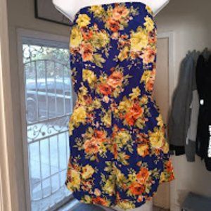 Strapless blue romper with burnt orange and yellow floral pattern, size small